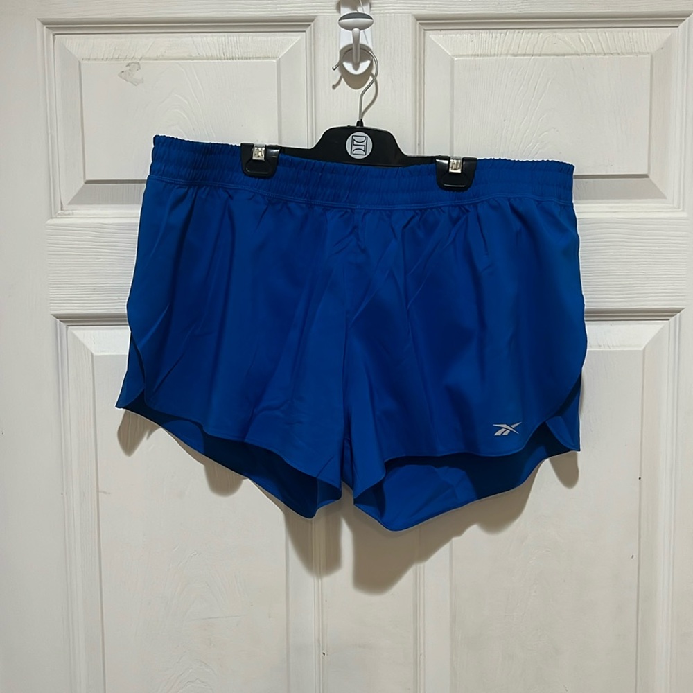 NWT. Reebok running shorts , Vector Blue, Size XL